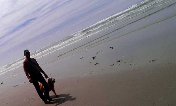 I'm walking Morgan on the Tillicum Beach, Behind: Miss Scarlet at the Yachats State Beach