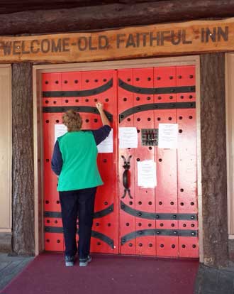The Old Faithful Inn is closed for the season but Gwen pounds on the door anyway