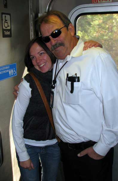 Ron, our train 5 conductor stands with Mindy just before we debark at Colfax