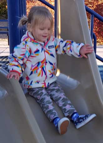 Lucy loves playground play equipment