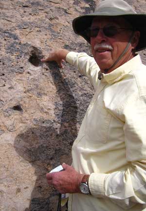 Ralph finds a petroglyph on one of the rocks