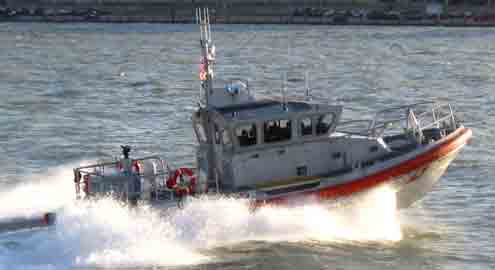 Coast Guard boat returning from harbor duty