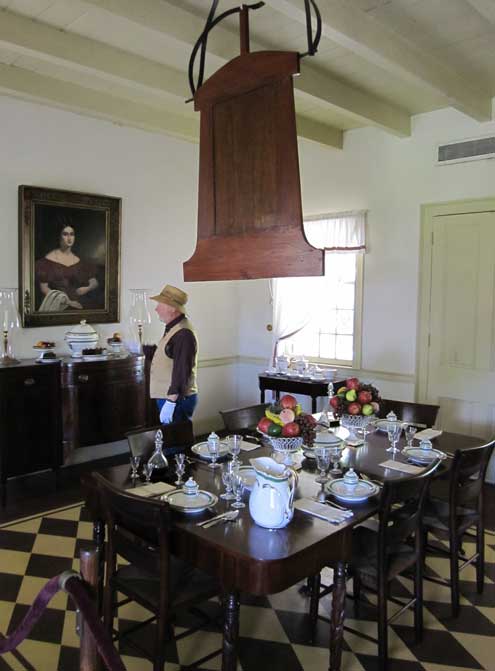 The dining room with large slave operated fan over the table
