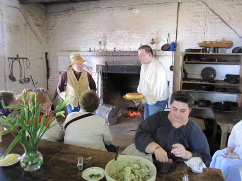 Cooking in the open hearth kitchen