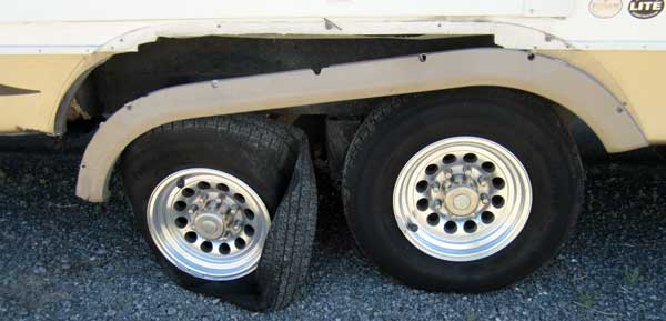 Rear right side trailer tire blows