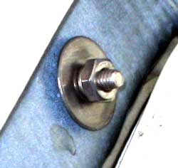 Sidewall bolt with flat washer and lock washer