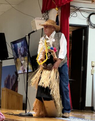 One of six decorated stick horses
