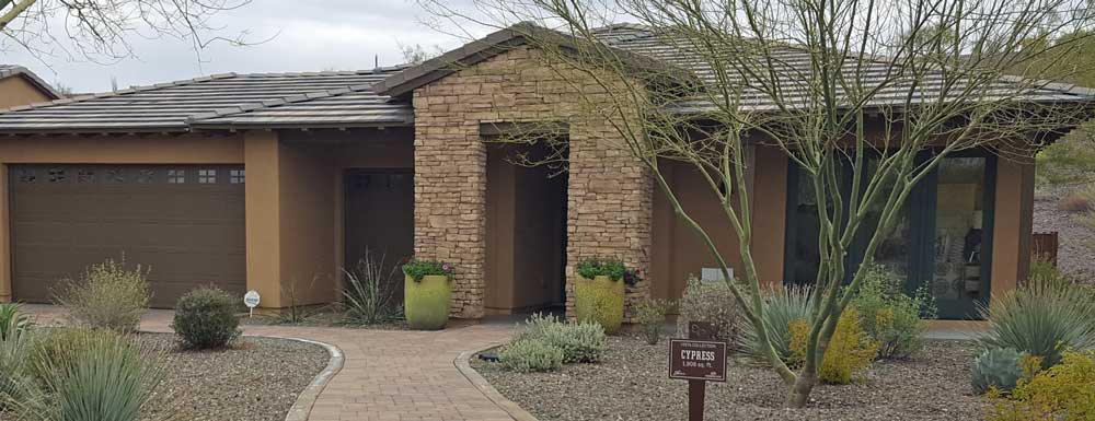 Looking at model homes with Jeanne and Gary