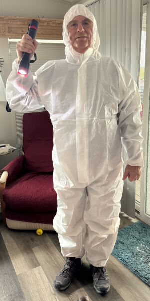 Hazmat suit to crawl under the park model