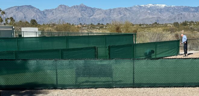 Privacy screen installed on the dog park fence
