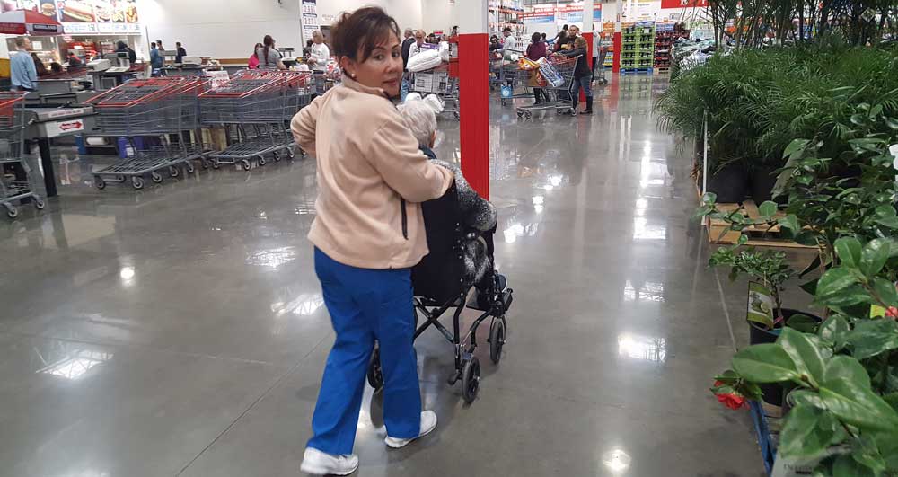 Rosie taking charge of Mom in Costco