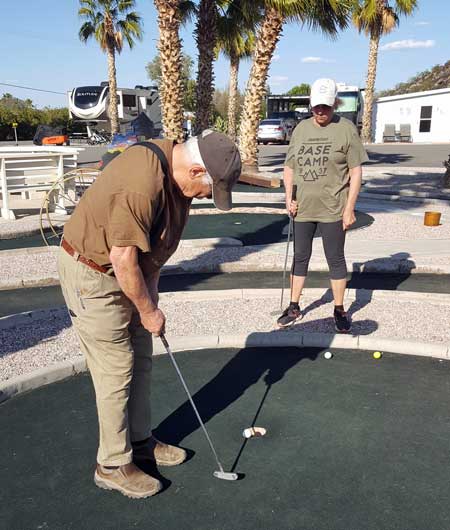 Playing miniature golf