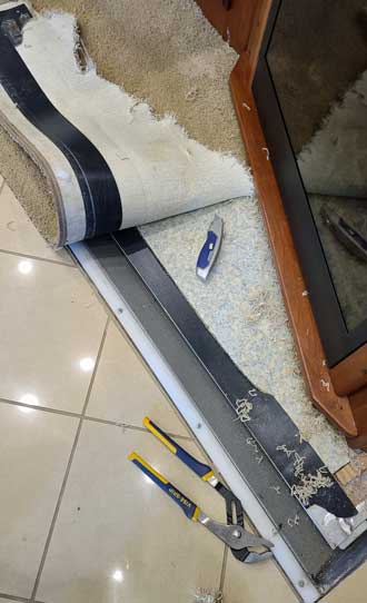 Removing the carpet 1/4" at a time
