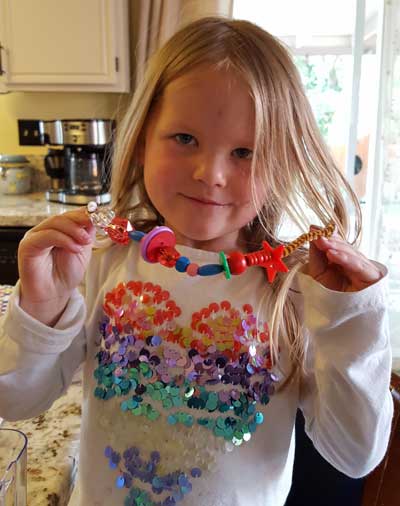 Showing off a handmade necklace