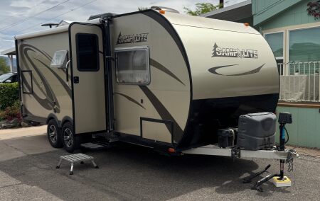 Parked in front of our absent neighbor's house