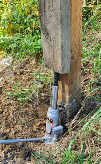 Jack the pole out of the ground.