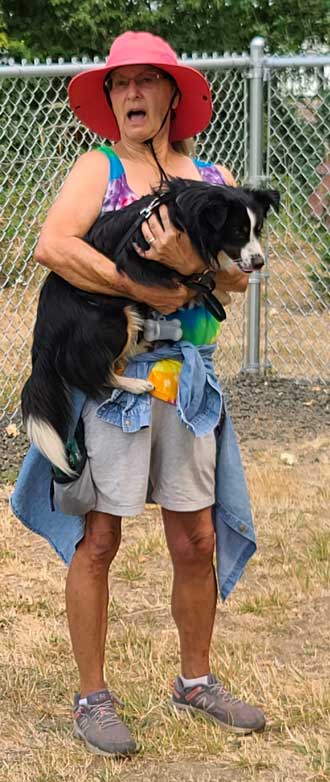 Joyce calms her dog