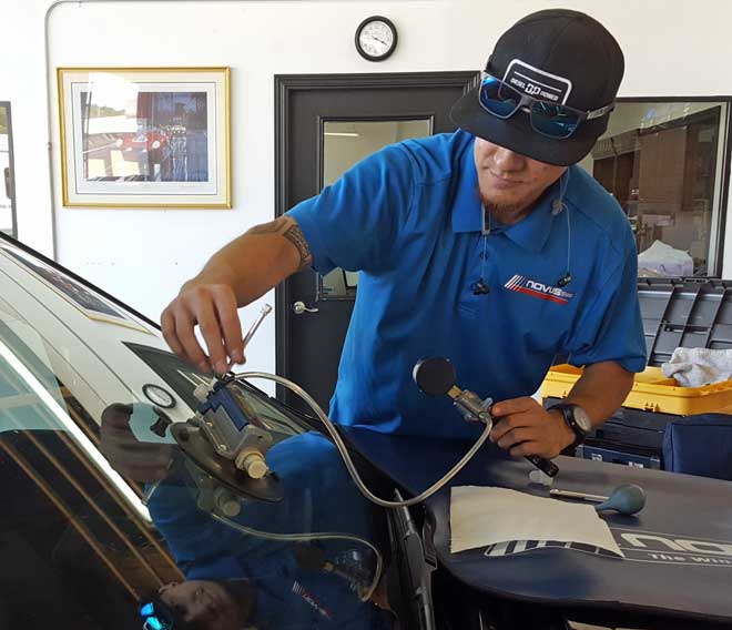 Justin repairing a rock chip