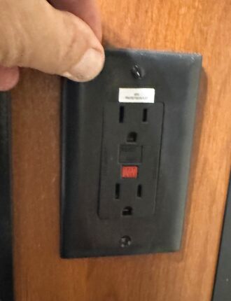 The only outlet in the bathroom