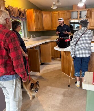 Kitchen talking to the inspector