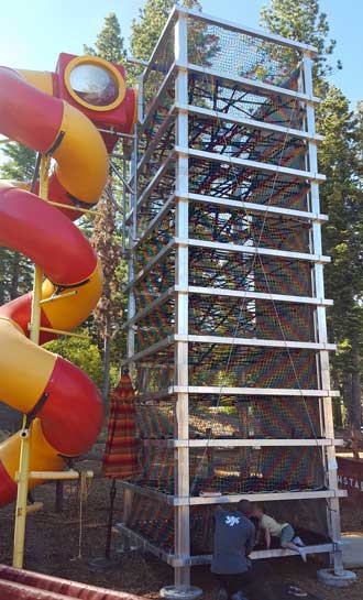 Lucy tries the spider slide