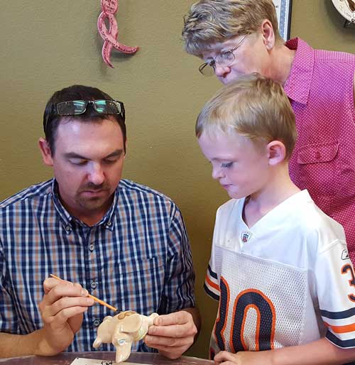 Ben, Noah and Gwen learn to paint clay