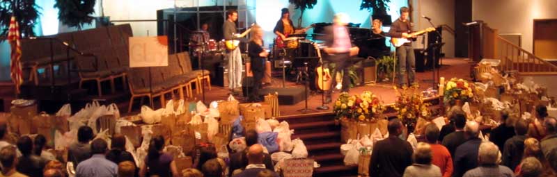 A Thanksgiving tradition at Temple Baptist in Lodi, groceries are brought to the front.