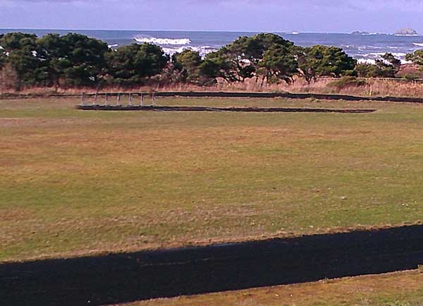 Gold Beach Highschool track with the Pacific in the distance