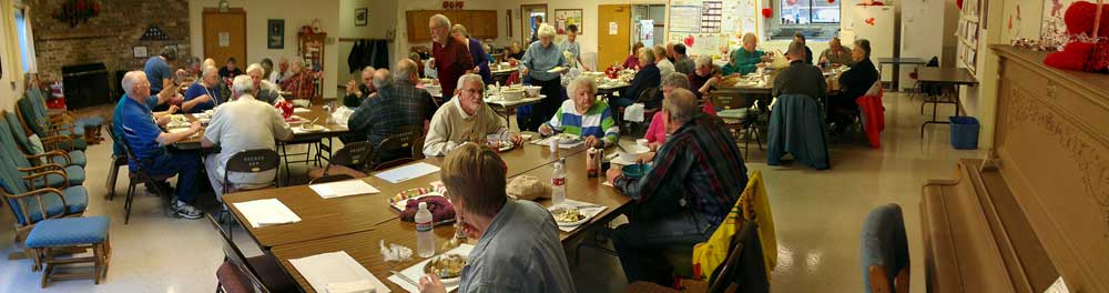 Enjoying baked potatoes in the Timber Valley Club House