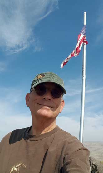 Hiking to the flag at the top of the hill