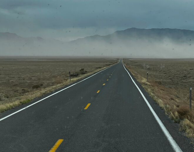 Heavy Wind causing a dust storm, behind is a full St George Elks RV Park