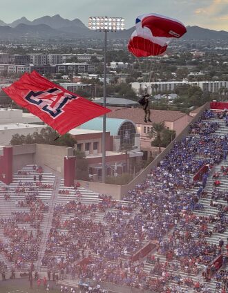 Flying the Arizona flag into the stadium