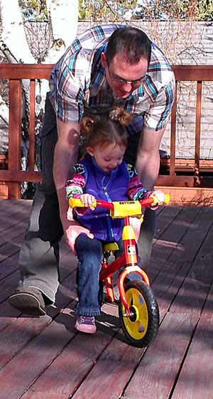 Chloe learning on a bicycle