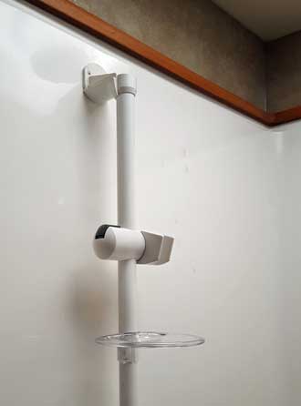 Adjustable shower head rod