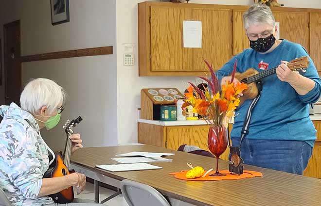 Kathy and Rocky at Ukulele class