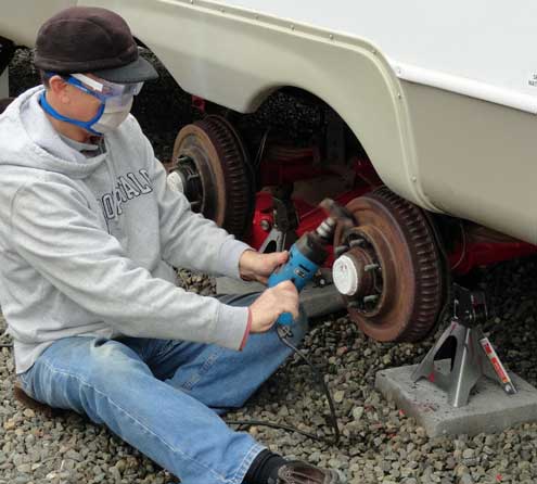 I'm getting the rust off the trailer drum brakes, preparing to paint them