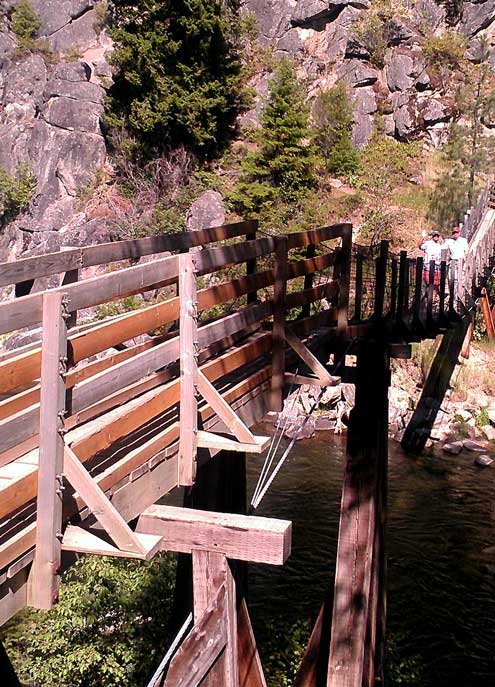 Ralph and I at the trailhead on a suspension bridge over Rock Creek