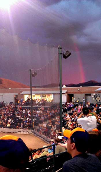 Lighting followed by a rainbow at the game