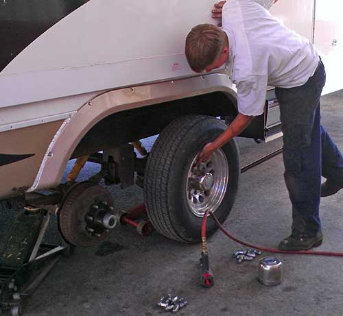 Tim from Les Schwab is about to check the brakes.