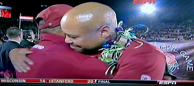 David Shaw hugs his father after Stanford's win at the Rose Bowl