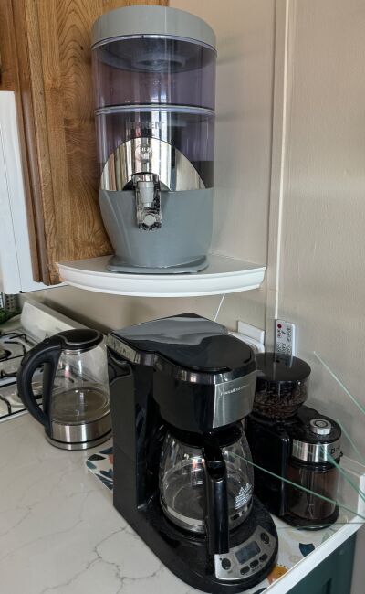 A shelf to hold the Nikken water filter
