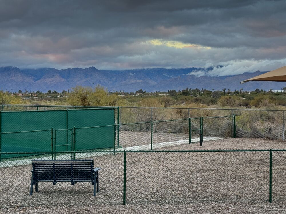 Our mountains appear again, note the new dog park fence.