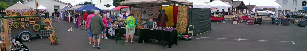 Wednesday Market in Waldport, Behind: unusual product, a didgerie do