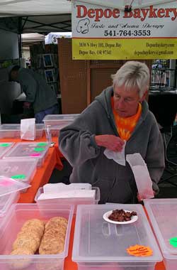 Alice serving cookies, I bought Gwen her favorite, peanut butter, Behind: Portia models two braided necklaces, I ordered a lanyard for Gwen. 