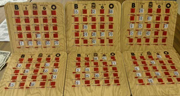 My six bingo cards, Behind: I won the 2nd largest pot, $21