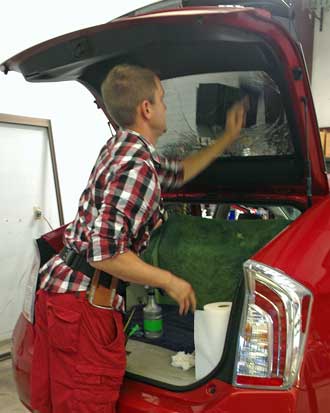 Prefitted hatchback tint is installed, Behind: Door panel popped out