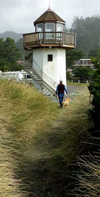 A private lighthouse viewing platform, Behind: painted rocks at the base of the lighthouse.