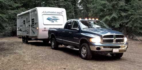 Overnight on Ski Run Road at base of Mt. Shasta, Behind: Panorama of forest parking area