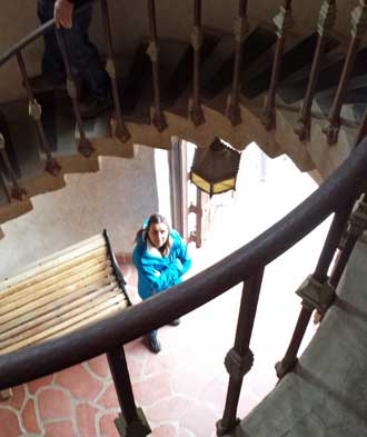 Looking down the tower staircase, Behind: 1914 Packard Touring Car