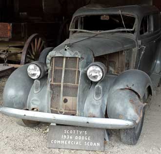 Walter Scott's Dodge, Behind: Ranch dump truck